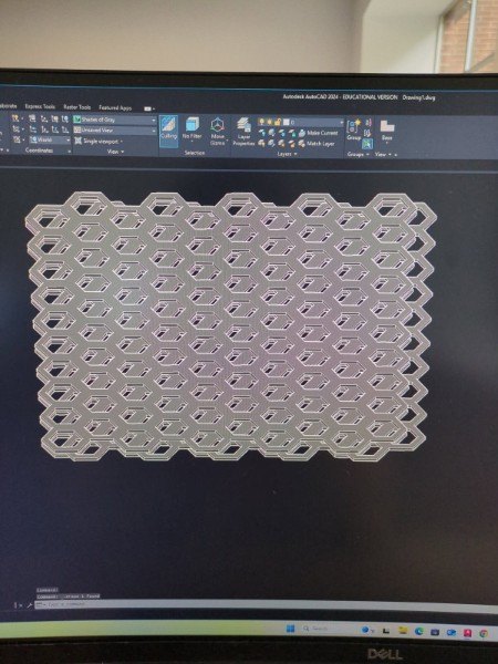 A hexagonal lattice scaffold modeled in CAD.