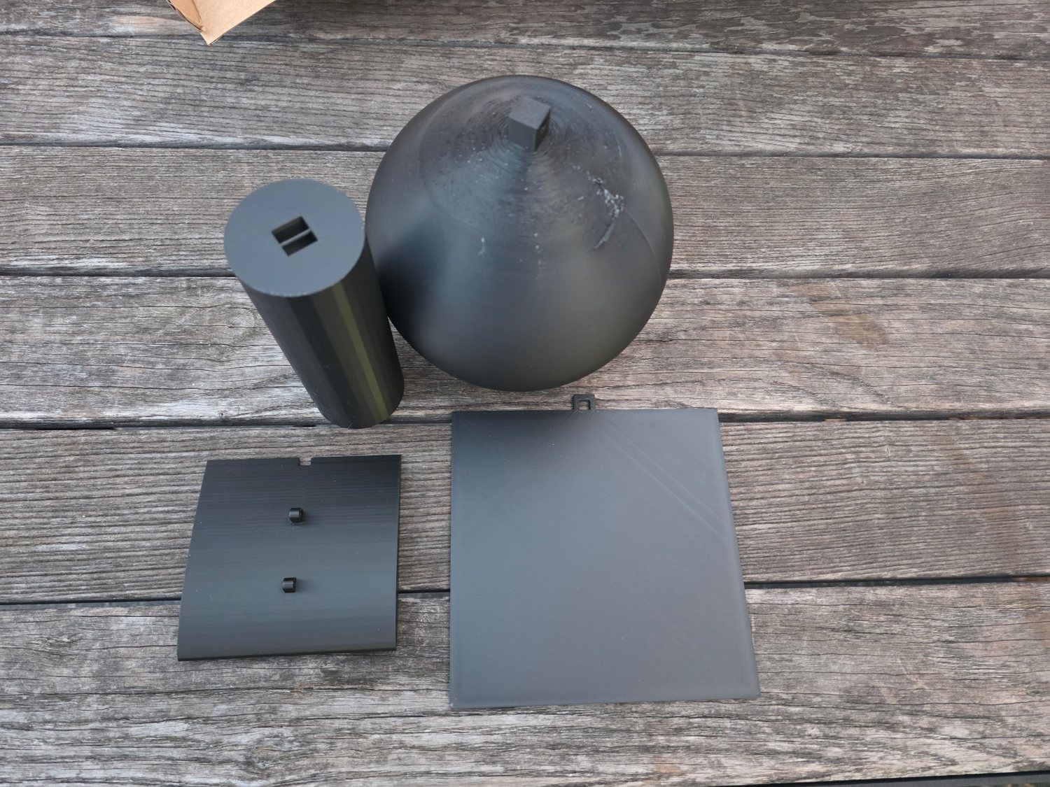 The four 3D-printed wind tunnel test shapes.