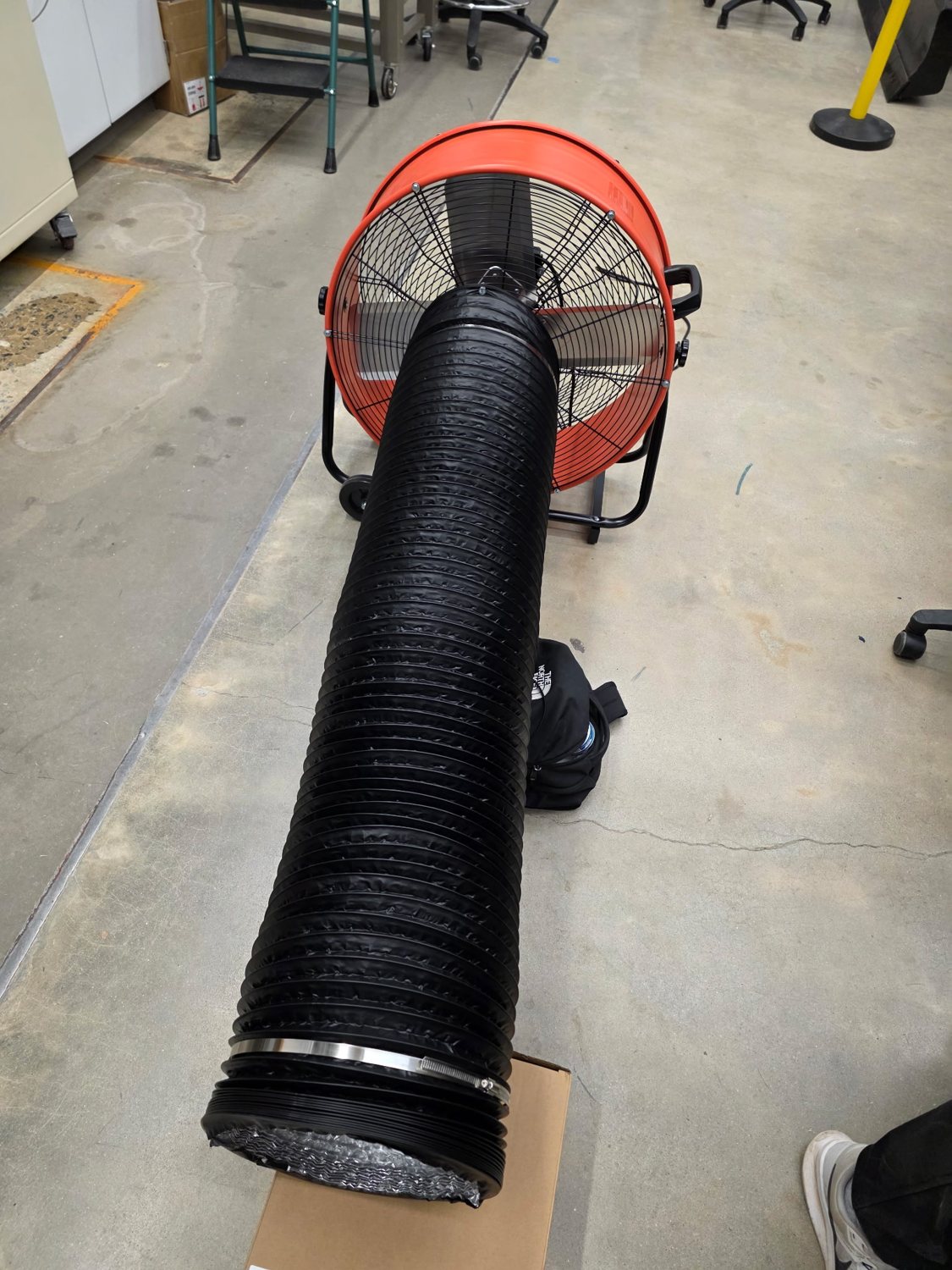 The wind tunnel rig: a drum fan feeding a ducted test section.